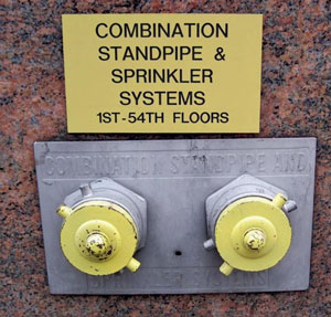 (3) The sign indicates a single-zone riser and a very high system pressure for feeding risers, requiring two pumpers.