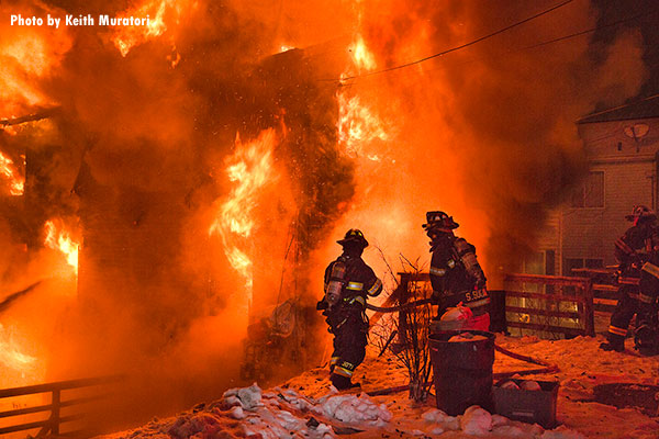 Firefighters at the scene of a structure fire in Derby, Connecticut.