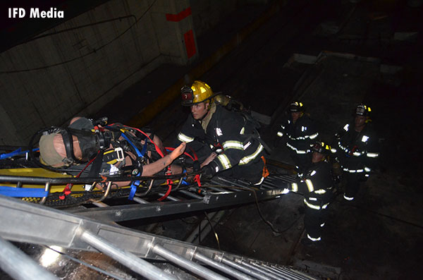 Technical Rescue: Indianapolis Firefighters Undertake Rope Rescue Training at Former Newspaper Site