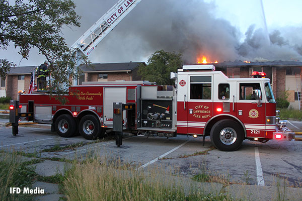 Lawrence (IN) fire apparatus at the scene of a working apartment building fire in Indianapolis.