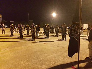 (1) Early morning formation at the Indiana Smoke Diver course. The day begins before the sun comes up.