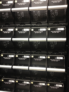 (8) The battery backup racks in this storage room support information technology.