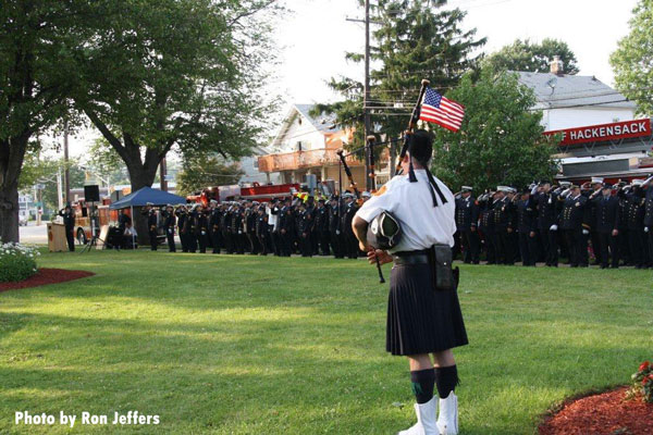 A bagpiper plays during the 2015 memorial for fallen Hackensack (NJ) firefighters.