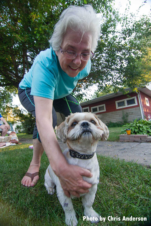 Marie Vyborny and her Shih Tzu, JoJo, following a fire at her home on Randy Road in Machesney Park.