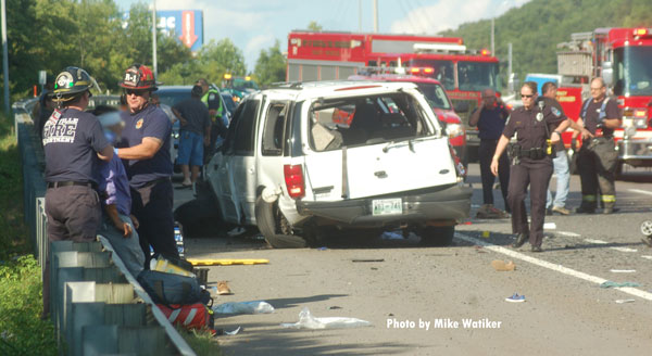 Firefighters attend to a patient after a deadly vehicle accident in Knoxville, Tennessee.