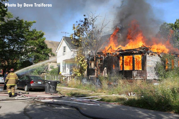 Detroit firefighters responded to a fully involved fire in a vacant dwelling that spread to an exposure.