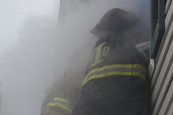 Firefighters at a window