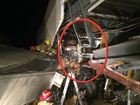 (6) Note the damage to the steel beam (red) and vertical column, resulting in the loss of the load path to the ground (circle).