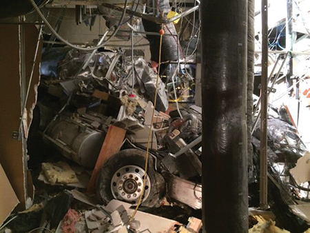 (7) The interior of the building with the tractor cab sitting in the electrical/equipment room adjacent to the MRI suite.