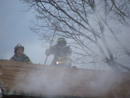 What happens when the firefighter doesn't fall all the way through the roof and attic?