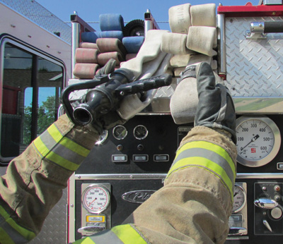 For a single-firefighter deployment, the firefighter grasps the nozzle and marked folds as described. The firefighter is basically creating the strategically placed hoops when pulling the hose from the bed. The hose load is now deployed as previously described.