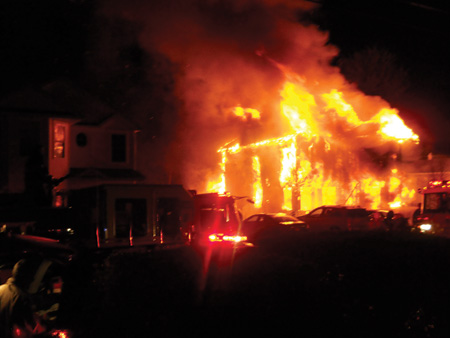 (1) Rapid interior and exterior fire spread will force us to change house fire tactics. This fire went from a mulch fire to fully involved in less than five minutes. (Photos by author.)