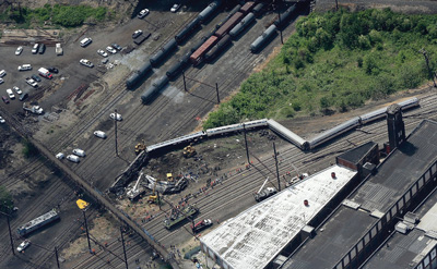 An aerial view of the derailment shows the large area over which it extended, requiring that the scene be split into two manageable geographic divisions