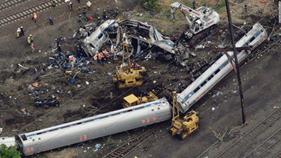 An aerial view of the derailment shows the large area over which it extended, requiring that the scene be split into two manageable geographic divisions