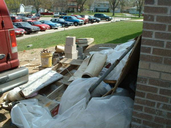 Contractors should clean up rubbish and debris as it is generated and put it in dumpsters, away from the building.