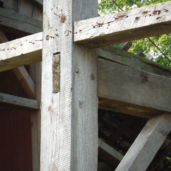 Photo 1 shows three mortise and tenon joints in a post and frame (post and beam) barn built around 1880. 