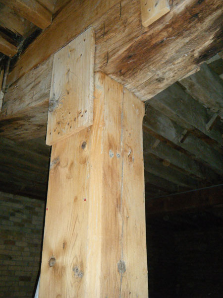 Photo 3 shows a beam and a column in a mill construction.