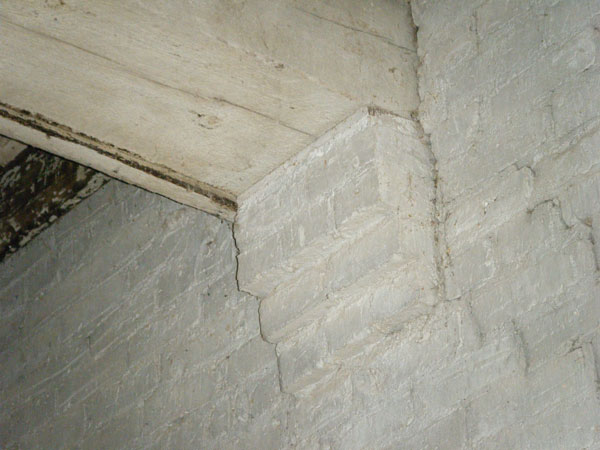 Photo 4  shows the end of the girder at a load-bearing masonry wall.