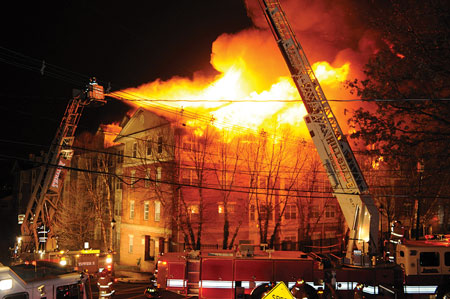  (8) The corner of Russell and Undercliff Avenues. Fire is spreading down Russell Avenue toward the east. 