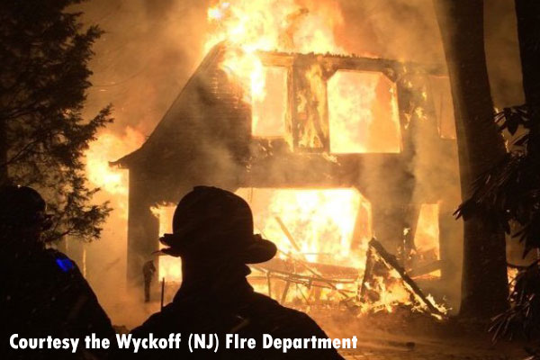 Firefighters respond to an early morning fire at a detached garage in Wyckoff, New Jersey.