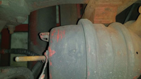 (1) The threaded bolt sticking out of the rear of the brake canister is a caging tool used to manually release the spring parking brake. (Photos courtesy of author.)