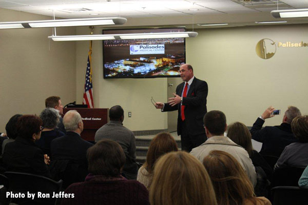 Dave Sanderson, who survived the Miracle on the Hudson, speaks to the auidence at Palisades Medical Center in North Bergen, New Jersey.