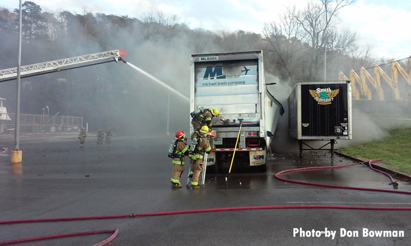 Firefighters on the scene of a tractor trailer fire.