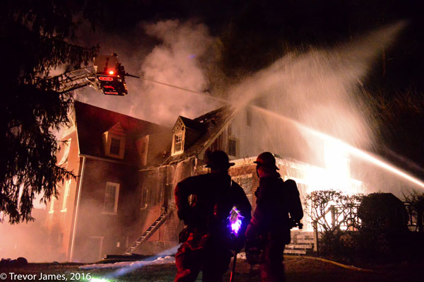 Firefighters at the scene of a house fire in Silver Spring, Maryland.