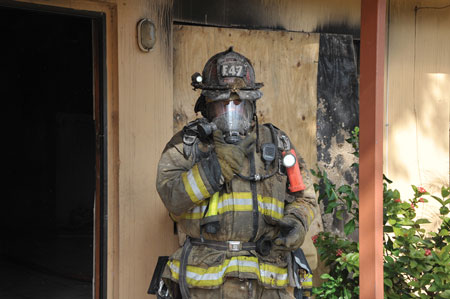 <b>(2) </b>Clean and inspect gear after every fire. <i>(Photo courtesy of Florida Fire Rescue Fire Marshal’s Office.)</i>