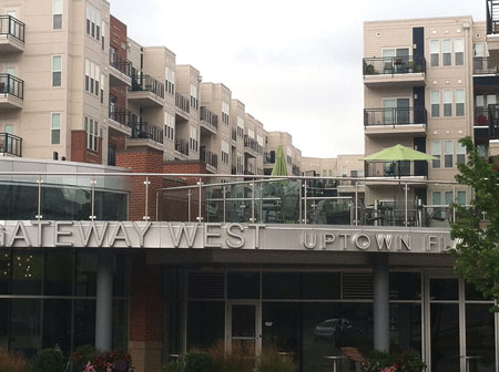 (2) The glass railing on this balcony is an obstacle that firefighters will have to deal with. Having an alternate plan of ladder transport is a good idea in this situation. (Photo by Scott Hardin.)