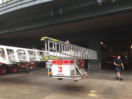  (7) Installing and using the stokes basket carrying brackets onto the front of the bucket create a ladder rack.