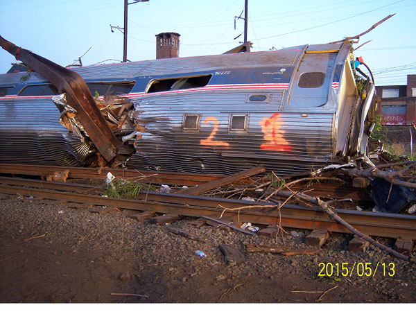 Damaged rail cars during a fatal Amtrak accident in Philadelphia.