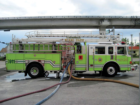 (4-6) This apparatus is pumping two three-inch hoselines to a standpipe system FDC. It is supplied with 100 feet of five-inch hose connected to a hydrant with a four-way valve and is pumping at a pump discharge pressure of 250 psi with a residual pressure of 50 psi.