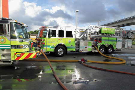 (12) The first-arriving engine lays in a five-inch supply line and supplies itself with three-inch hose, leaving the manifold’s large-diameter connection available for the later-arriving aerial apparatus.