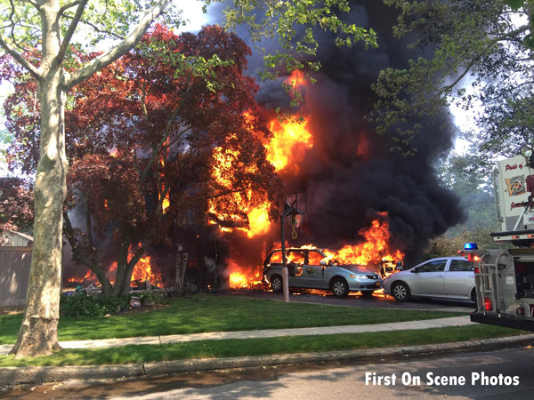 Crews on scene of a Jericho house fire.