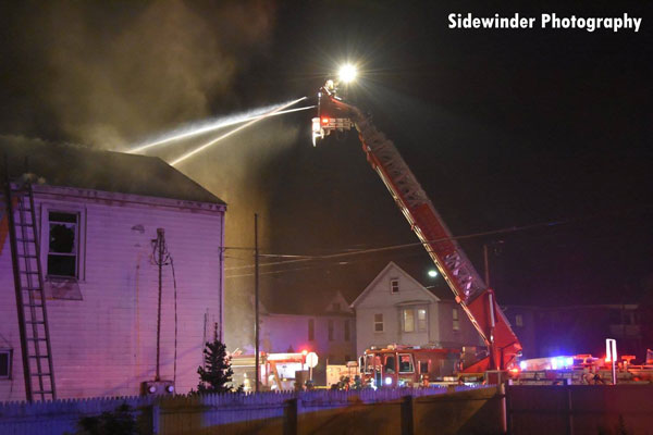 Aerial device in use at a structure fire in Watervliet, New York.