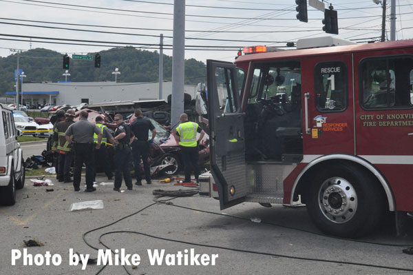 Firefighters at the scene of a deadly crash in Knoxville.