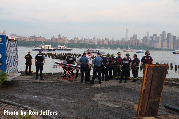 Responders at the scene of a deadly plane crash in the Hudson River.