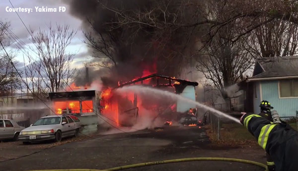 Firefighters on scene at a structure fire in Yakima, Washington.