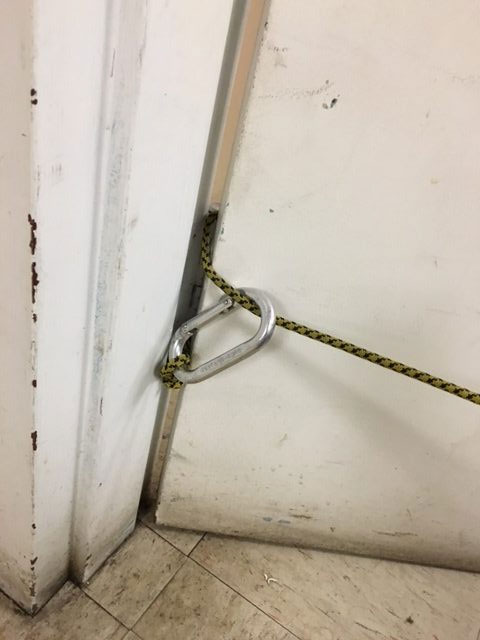 You can anchor a search rope through the bottom hinge of a door to the room being searched