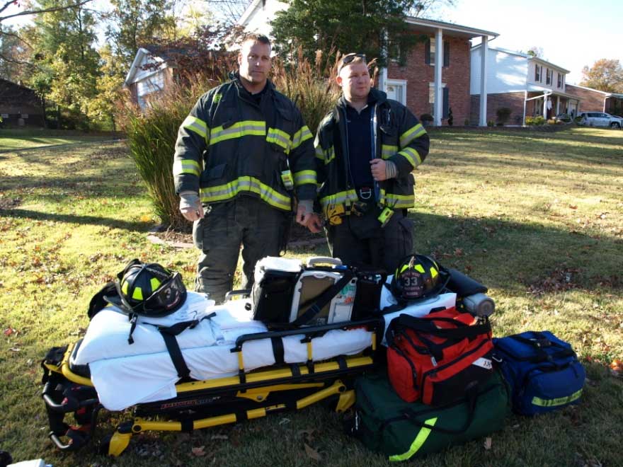 Firefighters with a stokes basket