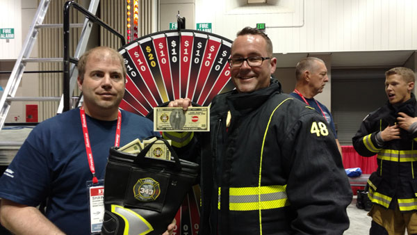 Firefighters help raise money for the Terry Farrel Firefighters Fund at FDIC International 2016.