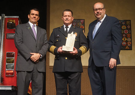 (3) Peter van Dorpe is flanked by award presenters Steve Pegram (left) and Glenn Corbett.