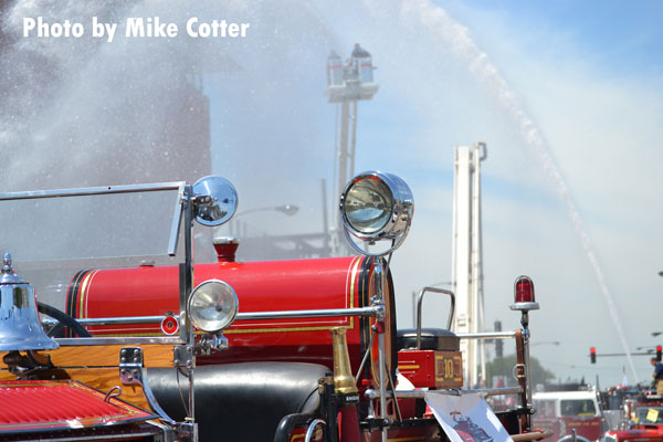 Water streams through the air and antique fire apparatus are on display at the recent Chicago Fire Department muster.