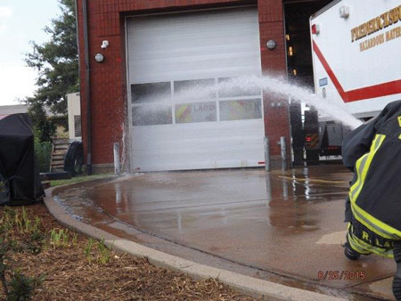 (10) The water is applied in the same manner, only this time personnel use a 15⁄16-inch smooth bore nozzle pumping at 40-psi nozzle pressure. Pumping the line at this nozzle pressure gave us a flow of approximately 165 gpm.