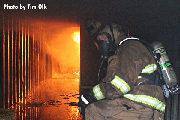 A firefighter undertakes training at the Monroe Fire School.