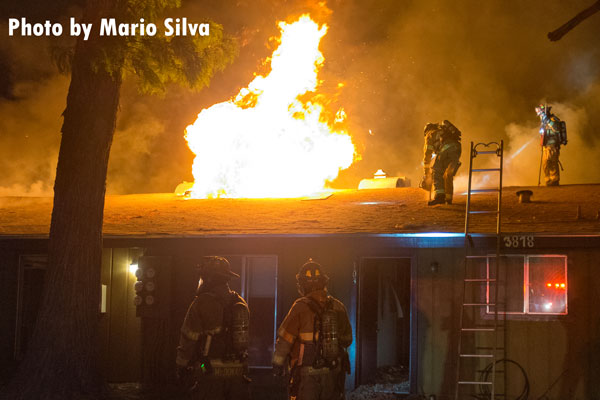 Fresno's Truck 4 crew peforms vertical ventilation at an apartment fire.