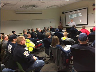 Students attend training on avoiding fire scene chaos.