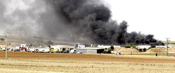 Smoke billows from a fire at a fireworks factory in Spain.