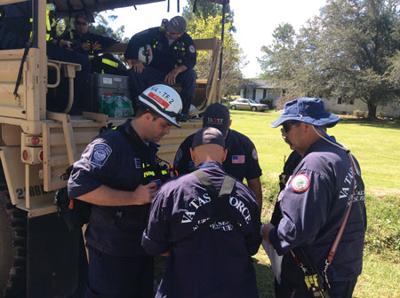 (1) VA-TF2 members working lower Richland County. <i>(Photos courtesy of VA-TF2.)</i>